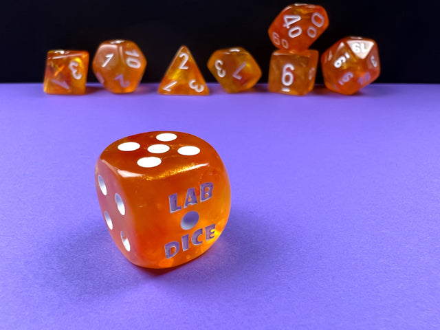 Load image into Gallery viewer, Chessex Borealis Blood Orange/white Luminary Polyhedral 7-Dice Set (with bonus die)
