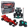 Red and green formula RC race cars with remotes in front of their boxes