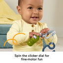 Baby turning the clicker dial on the Reel Fun Fishing pole