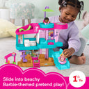 Child playing with the Little People Barbie Beach House and figures, labeled for ages 1.5 years and up