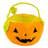 Orange plush jack-o'-lantern pumpkin basket with green handle