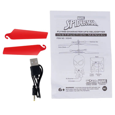Spare red rotor blades, USB charging cable and instruction sheet