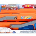 Hot Wheels City Speed Track Transporter orange and blue hauler in its retail box with one toy car