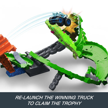 Monster truck launching into the collapsed dragon's mouth on the Dragon Destruction playset