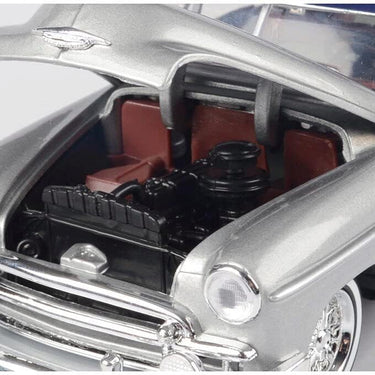 1950 Chevy Bel Air Lowrider Silver Metallic with Blue Metallic Top Get Low Series 1/24 Diecast Model Car