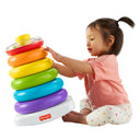 Toddler stacking the colorful rings of the Fisher-Price Giant Rock-a-Stack