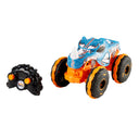 Front view of the Rhinomite RC monster truck showing its rhino horn, next to the remote
