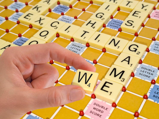 Tile Lock Scrabble by Winning Moves Games USA, Innovative Gameboard "Locks" Tiles In Place, for 2 to 4 Players, Ages 8 and Up