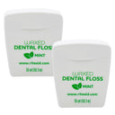 Two white Rite Aid waxed mint dental floss containers