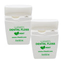 Two Rite Aid dental floss containers with lids open