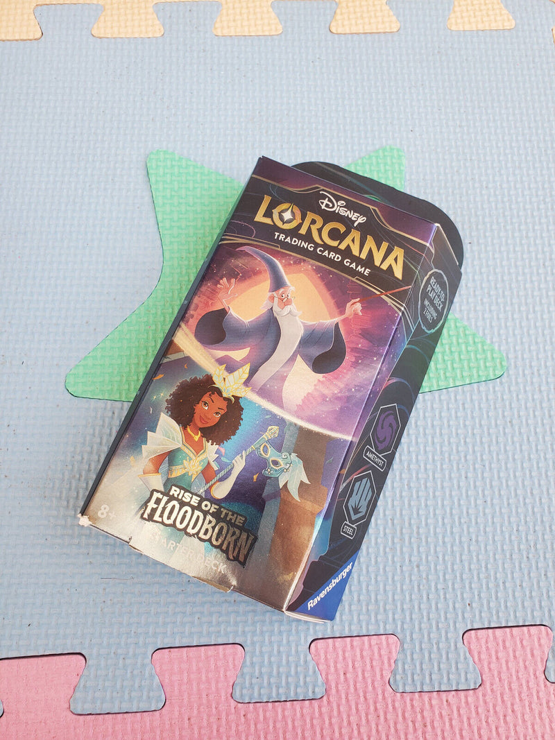 Load image into Gallery viewer, Disney Lorcana Trading Card Game Rise of the Flooborn Amethyst and Steel Starter Deck
