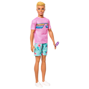 Ken doll in a pink graphic t-shirt, floral shorts and white sneakers holding a frozen treat