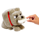 Hand feeding the bone accessory to the Minecraft Dennis wolf plush