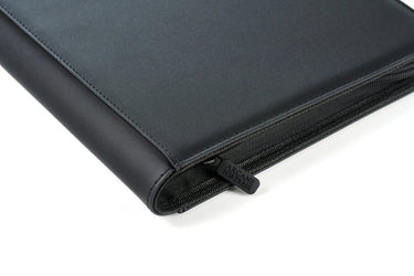 Close-up of the black Arcane Fortress binder's zipper and textured cover