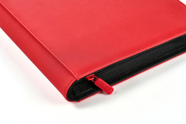 Close-up of the red Arcane Fortress binder's zipper and cover