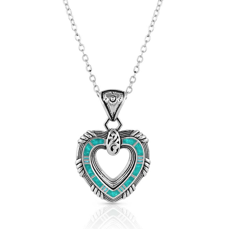 Load image into Gallery viewer, Montana Silversmith Love Conquers All Heart Necklace
