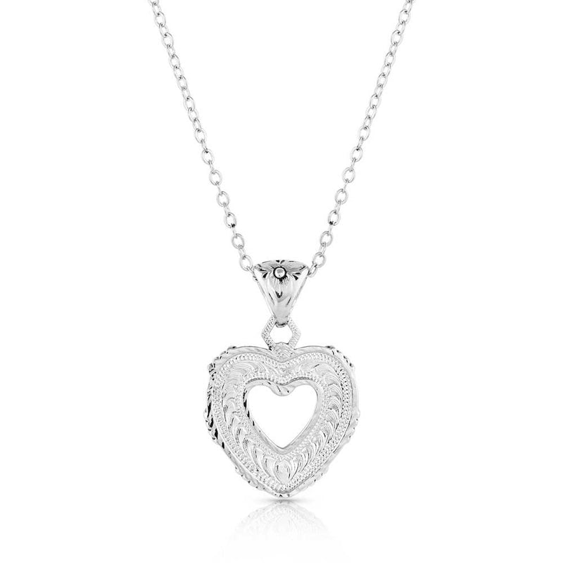 Load image into Gallery viewer, Montana Silversmith Love Conquers All Heart Necklace
