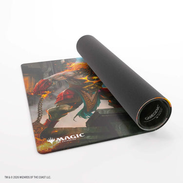 Ajani Reality Fracture playmat partly rolled up, showing the black rubber back