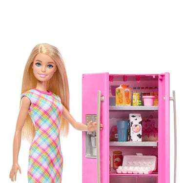 Close-up of Barbie doll opening the pink fridge with food, milk and eggs on the shelves