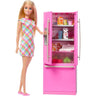 Barbie doll in a plaid dress next to the open hot-pink refrigerator stocked with food