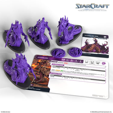 Four purple Hydralisk miniatures on bases with the unit and tactical cards