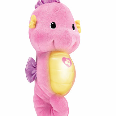 Side view of the pink Soothe & Glow Seahorse plush with its light off