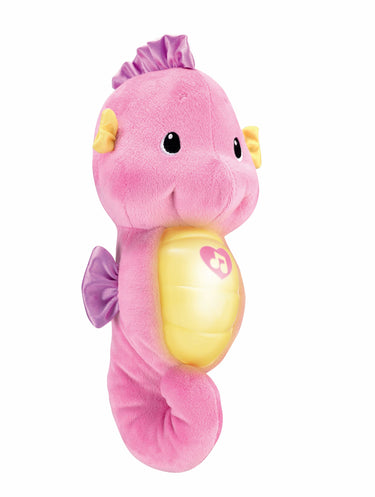 Side view of the pink Soothe & Glow Seahorse plush with its light off