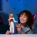 Child playing with the Disney Zombies 4 Nova Bright doll wearing sunglasses