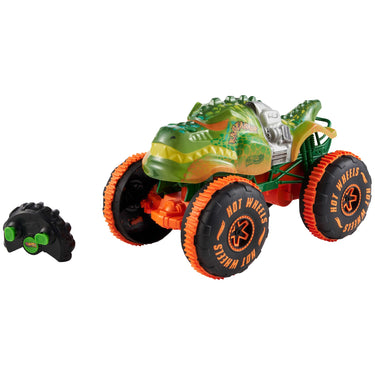 Front view of the RC Rageasaur monster truck with its remote