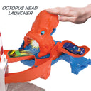 Hand pressing the octopus head launcher on the Octopus Invasion Attack set