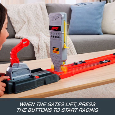 Formula 1 start tower and red side-by-side track on a table