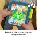 Child's finger pressing a button on the Puppy's Storytime Reader screen