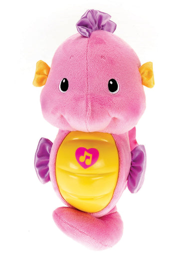 Front view of the pink Soothe & Glow Seahorse with a heart music note on its yellow belly