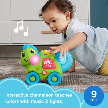Baby crawling after the Link Squad Chameleon toy