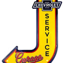 A vintage-style Chevrolet Service Garage sign shaped like a yellow arrowhead with an arrowhead tail, featuring the Chevrolet logo at the top and 'Garage Service' in red and black lettering on a white background.