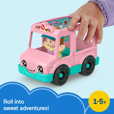 Child's hand pushing the Little People ice cream truck with figure inside, labeled for ages 1 to 5 years