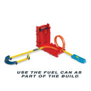 Red fuel can case used as part of a track build with a loop, curves and a blue launcher