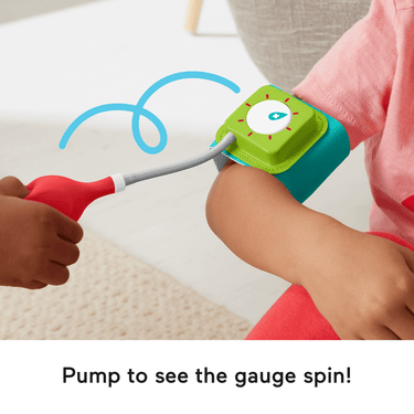 Child pumping the toy blood pressure cuff on an arm