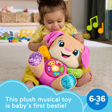 Toddler hugging the Smart Stages Sis plush toy
