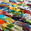 Close-up of many colorful Hot Wheels die-cast cars grouped together