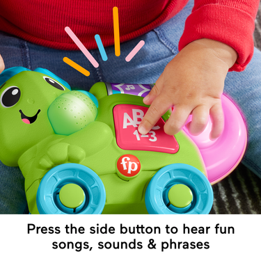 Hand pressing the side button on the Link Squad Chameleon toy