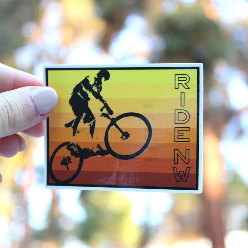 Load image into Gallery viewer, Yellow-to-Orange Stripes Mountain Biker Ride NW Sticker

